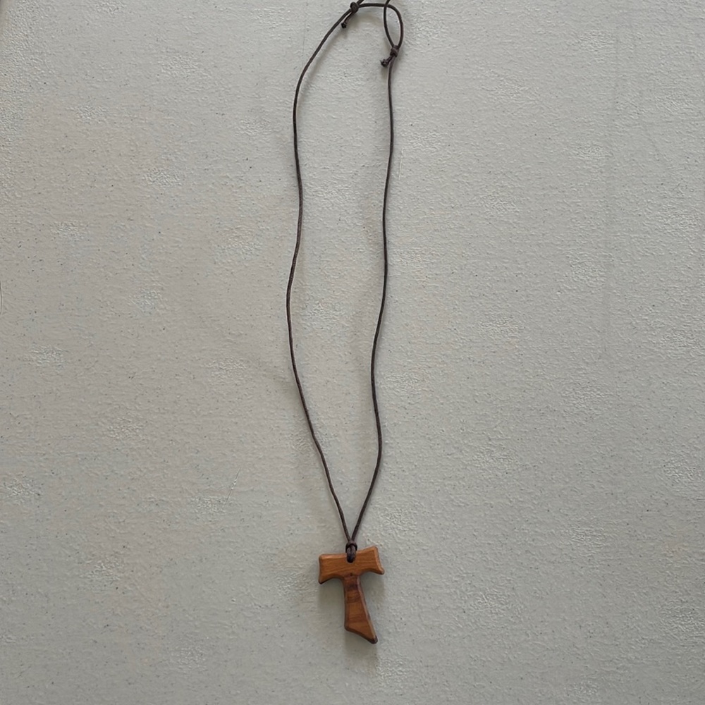 T wooden necklace. Never used